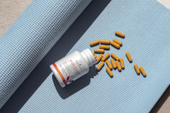 Young Living AgilEase open bottle with capsules for easy daily take.
