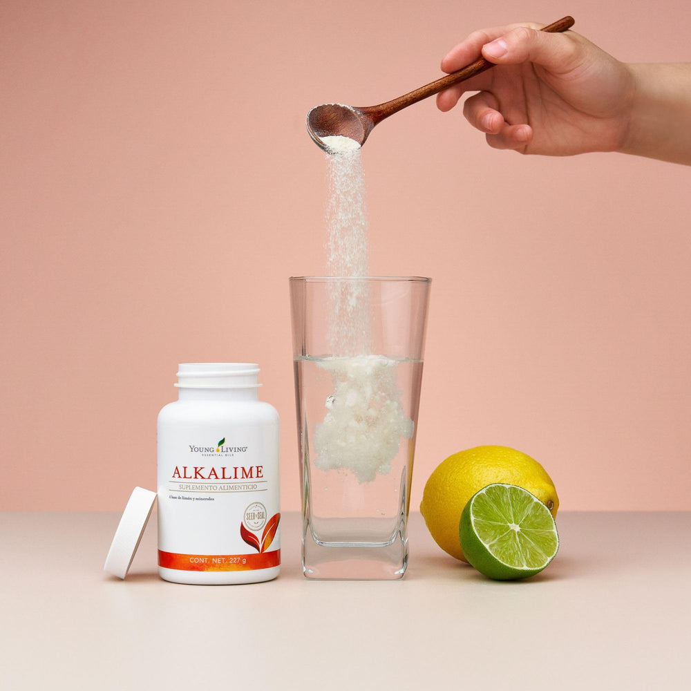 Young Living AlkaLime lemon-lime essence close-up highlighting natural ingredients.