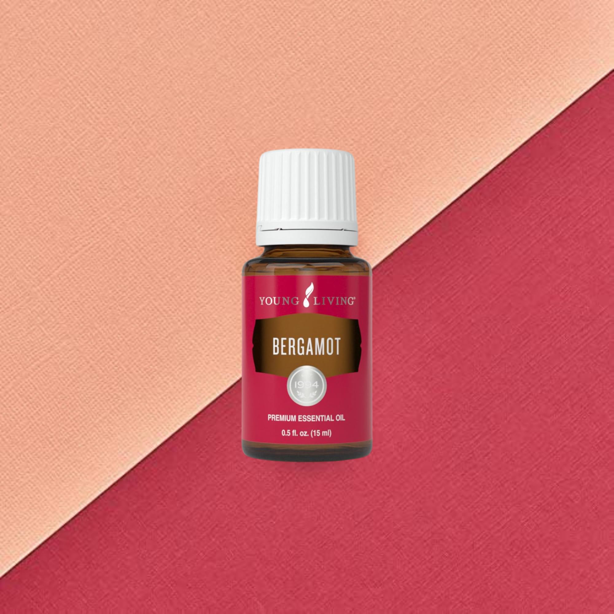 Young Living Bergamot oil diffusing in a diffuser to create a calming ambiance.