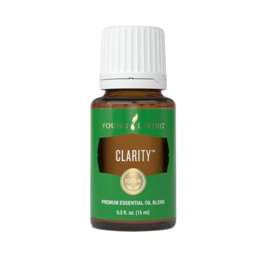 Young Living Clarity bottle being poured for diffusion and topical use for focus.