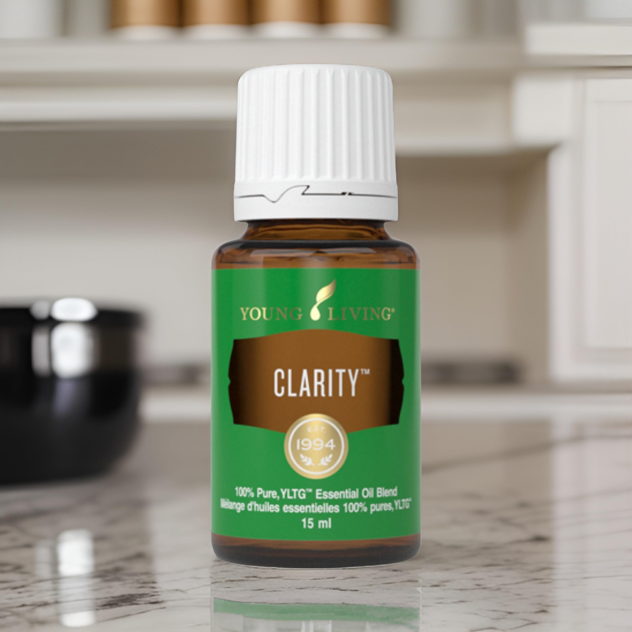 Young Living Clarity bottle beside V-6 carrier oil for dilution.