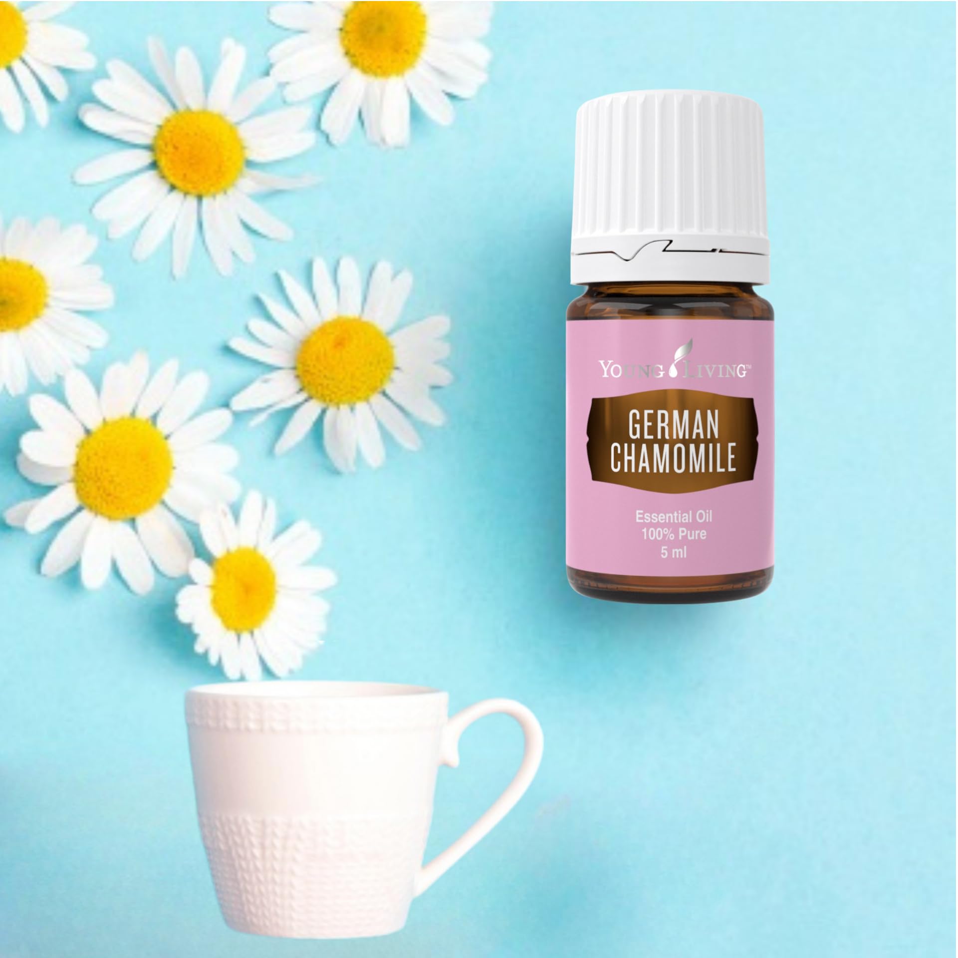 Pour action of Young Living German Chamomile 5ml bottle for easy topical use