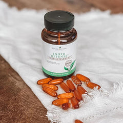 Young Living Inner Defense ingredients label featuring oregano and thyme highlighted.