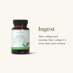 Young Living Inner Defense softgels held in hand for easy daily use.