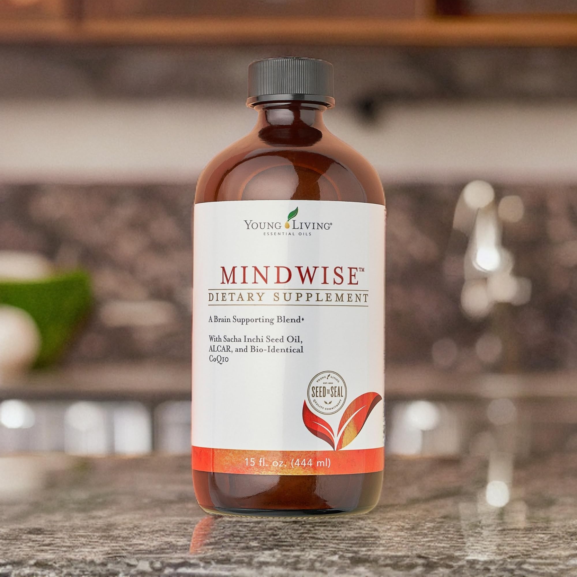 MindWise bottle next to glass of water for convenience.