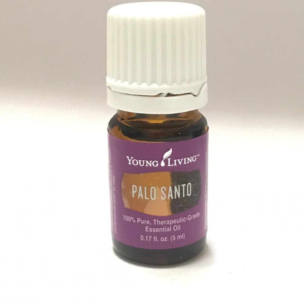 Young Living Palo Santo diffuser scene creating a purifying, focused atmosphere.