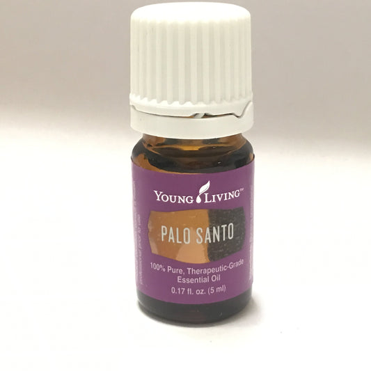 Young Living Palo Santo diffuser scene creating a purifying, focused atmosphere.
