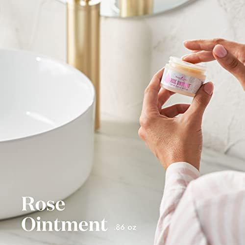 Rose Ointment cream texture ready for gentle application on dry areas.