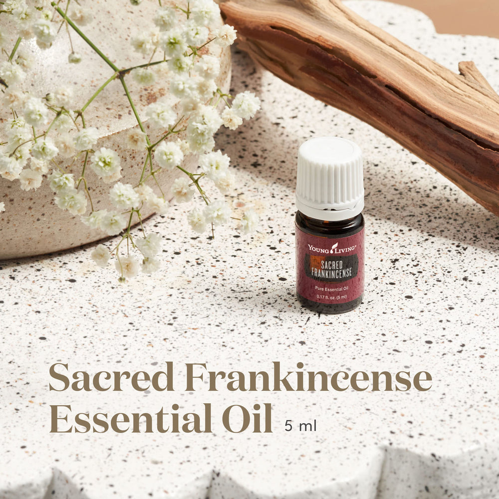Young Living Sacred Frankincense pour, grounding aroma for mindful rituals.