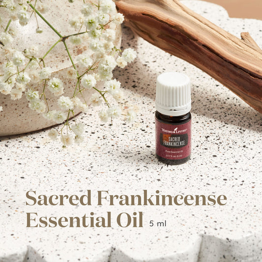 Young Living Sacred Frankincense pour, grounding aroma for mindful rituals.