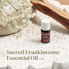 Young Living Sacred Frankincense pour, grounding aroma for mindful rituals.