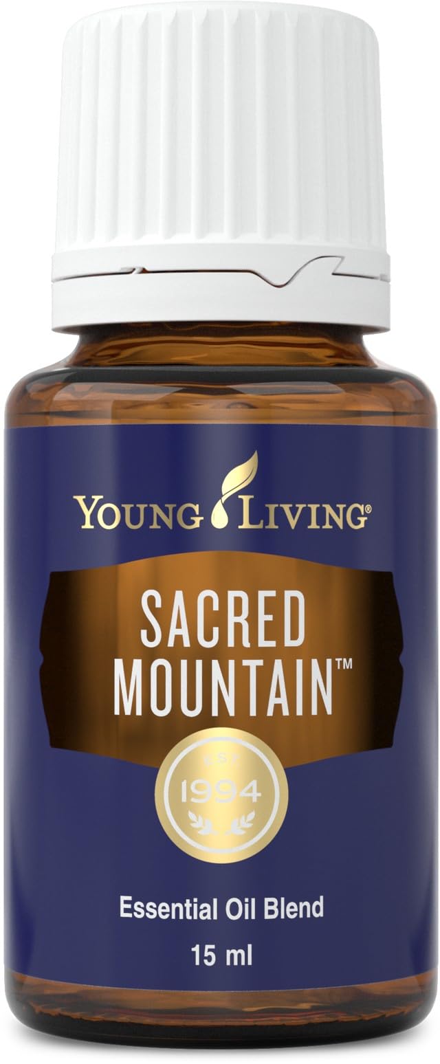Young Living Sacred Mountain bottle pour promotes calm energy and grounding.