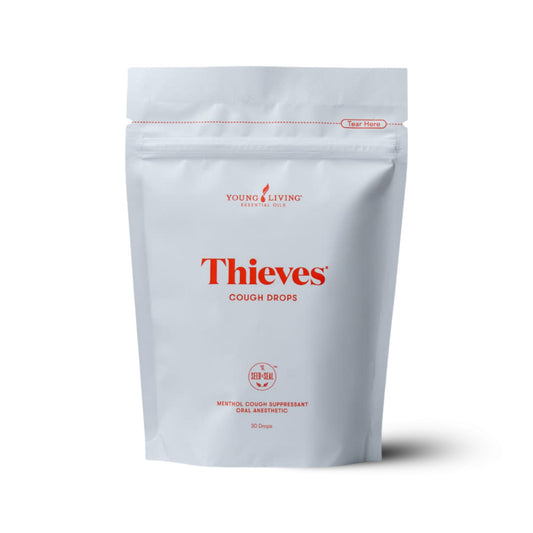 Young Living Thieves cough drops pack close-up for on-the-go throat relief.