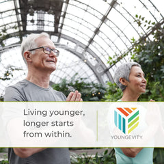 Youngevity Ultimate Gluco-Gel in-use scene with a person taking capsules.