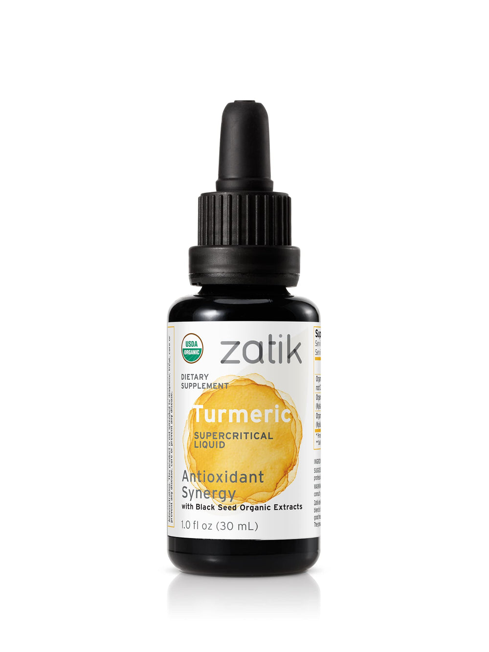 Zatik Turmeric Supercritical Liquid bottle with amber oil ready for daily use