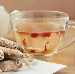 Zen Ginseng steeping tea cup with warm aroma for a calming moment.