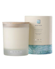 Zents Water Chamomile Coriander Lemon candle in a jar elevates living space with fresh aroma.