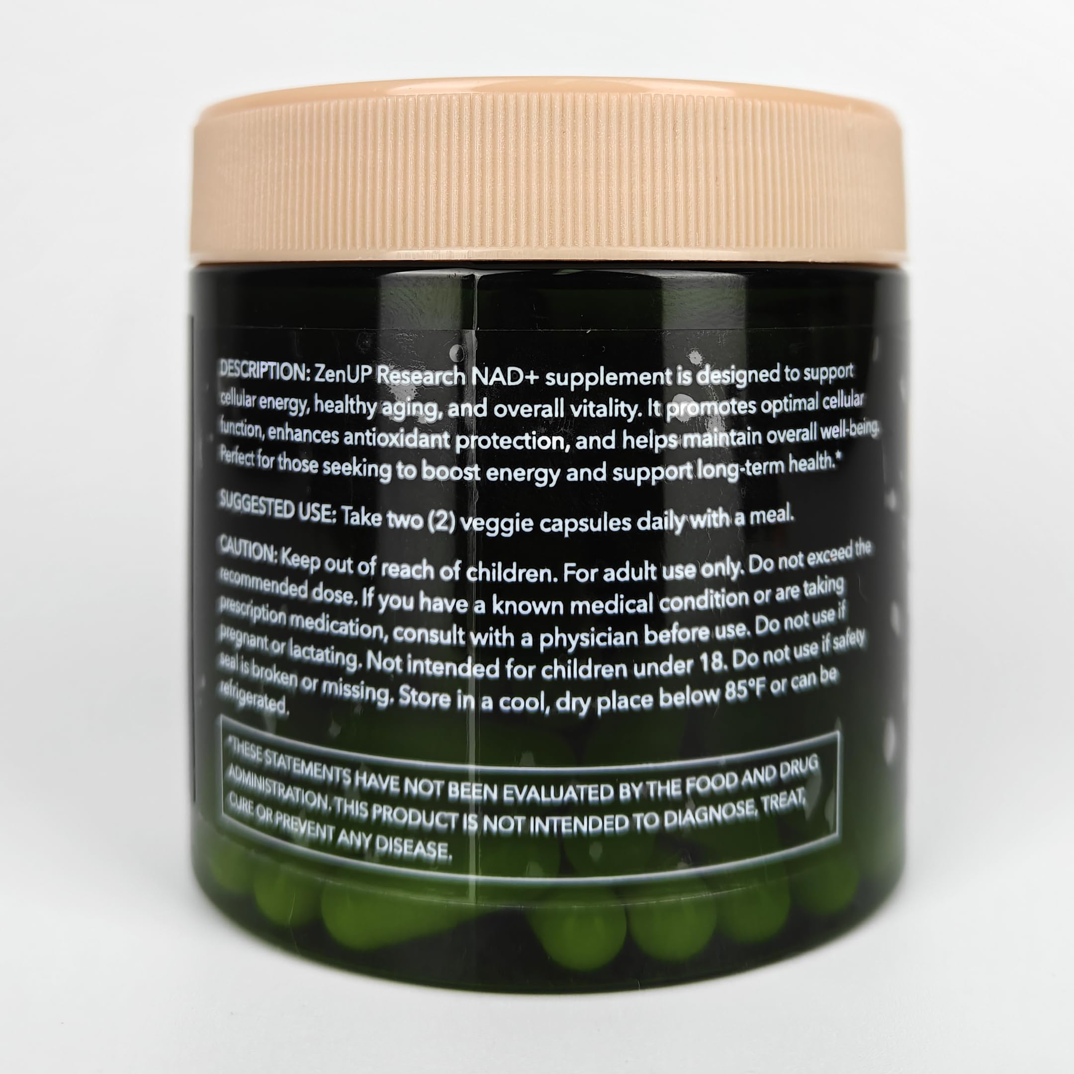 ZenUP NAD+ capsules in hand illustrating convenient daily capsules.