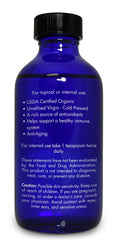 Zongle Therapeutics label close-up emphasizes organic, non-GMO quality for skin and hair care.